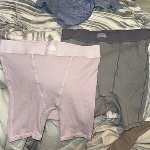 Skims shorts lavender and gray